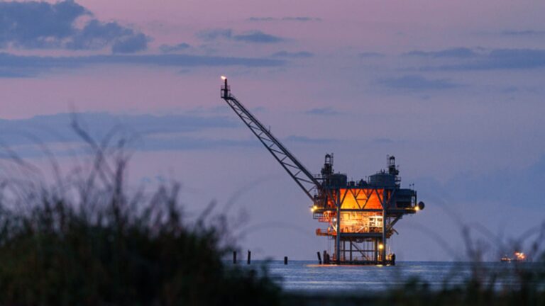 WTI tops $77 per barrel