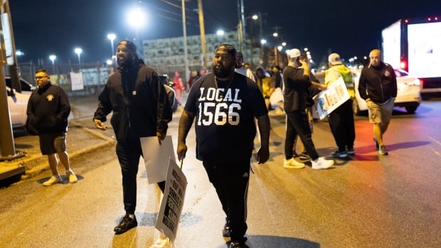 Dockworkers on U.S. East Coast strike, halting half the nation’s ocean