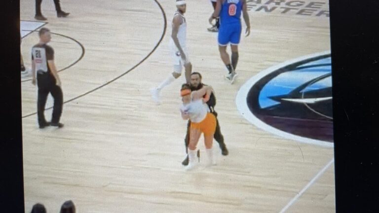 Models storm court during Timberwolves-Knicks game to promote