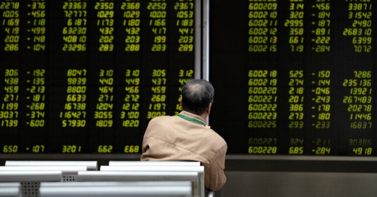 Stocks churn as traders assess Fed outlook following rate cut