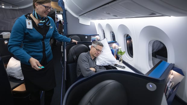Why some airline travellers are opting for a seat upgrade, despite the big