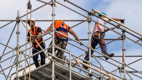 Israel builders warn of fresh housing delays after foreign worker